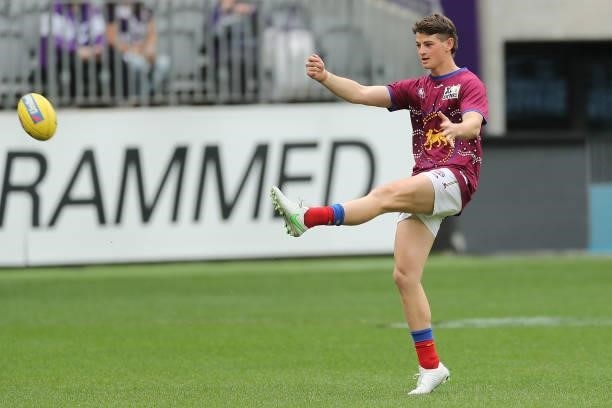 Jaxon Prior of the Lions practices kicking before the 2021 AFL Round 21 match between the Fremantle Dockers and the Brisbane Lions at Optus Stadium...