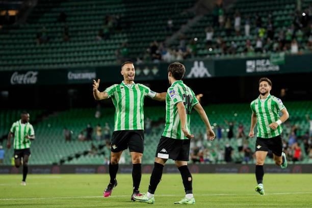 Rodri Sanchez of Real Betis with Sergio Canales of Real Betis celebrates goal 1-0 during the Club Friendly match between Real Betis Sevilla v AS Roma...