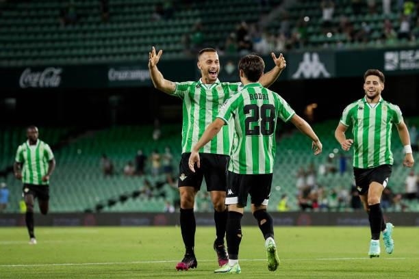 Rodri Sanchez of Real Betis with Sergio Canales of Real Betis celebrates goal 1-0 during the Club Friendly match between Real Betis Sevilla v AS Roma...