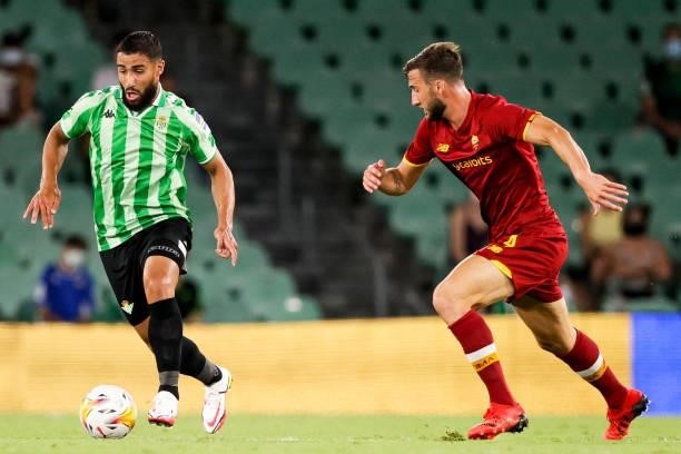 Nabil Fekir of Real Betis, Bryan Cristante of AS Roma during the Club Friendly match between Real Betis Sevilla v AS Roma at the Estadio Benito...
