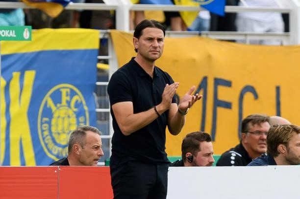 Head coach Gerardo Seoane of Bayer 04 Leverkusen gestures during the DFB Cup first round match between 1. FC Lok Leipzig and Bayer Leverkusen at...