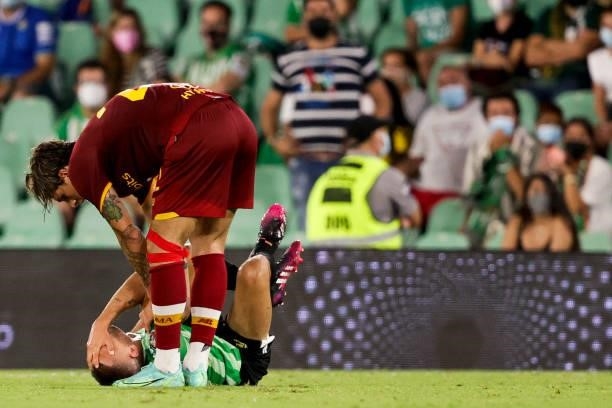 Sergio Canales of Real Betis, Nicolo Zaniolo of AS Roma during the Club Friendly match between Real Betis Sevilla v AS Roma at the Estadio Benito...