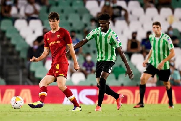 Bryan Cristante of AS Roma, Eldor Shomurodov of AS Roma, Paul Akouokou of Real Betis during the Club Friendly match between Real Betis Sevilla v AS...