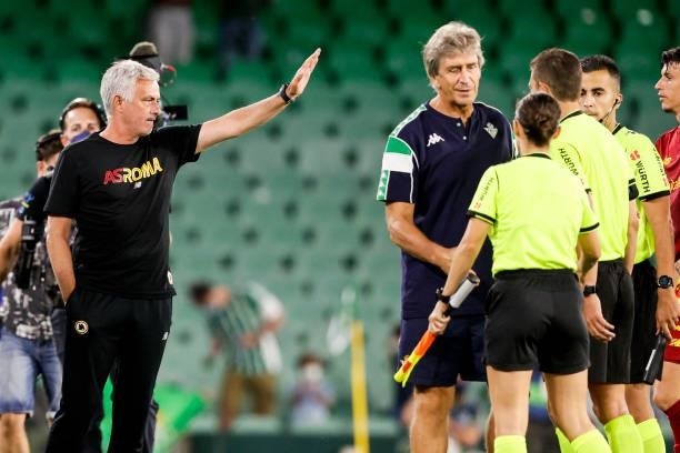 Coach Jose Mourinho of AS Roma, coach Manuel Pellegrini of Real Betis, referee Jorge Figueroa Vazquez during the Club Friendly match between Real...