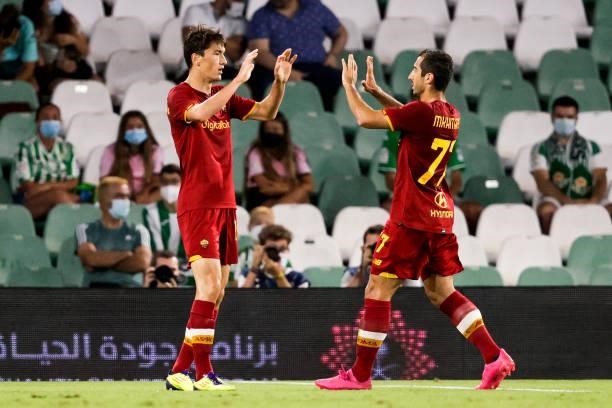 Eldor Shomurodov of AS Roma with Henrikh Mkhitaryan of AS Roma celebrates goal 2-2 during the Club Friendly match between Real Betis Sevilla v AS...