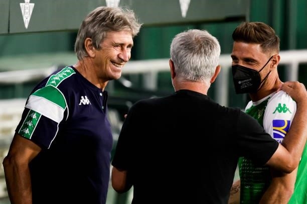 Coach Manuel Pellegrini of Real Betis, coach Jose Mourinho of AS Roma, Joaquin Sanchez of Real Betis during the Club Friendly match between Real...