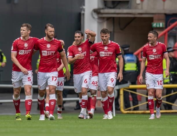 Bristol City players celebrate Andy King scoring the opening goal during the Sky Bet Championship match between Bristol City and Blackpool at Ashton...