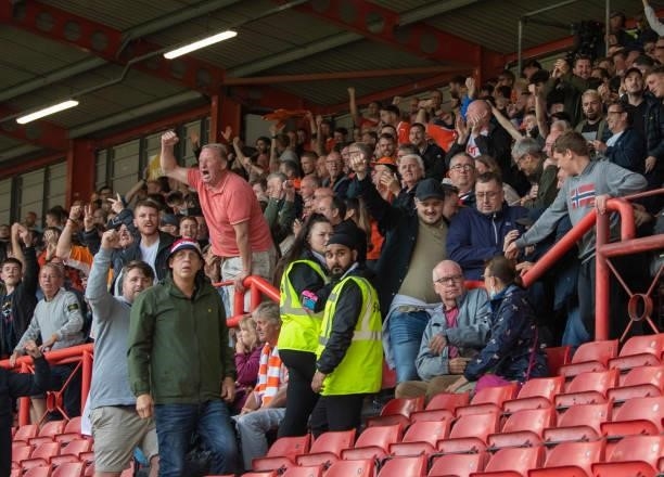 Blackpool fans celebrate Shayne Lavery scores his side's equalising goal in injury time to make the score 1-1 during the Sky Bet Championship match...