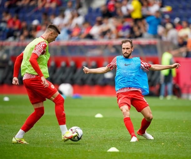 Benjamin Sesko and Andreas Ulmer of FC Red Bull Salzburg in action during the warmup session prior to the Admiral Bundesliga match between FC Red...