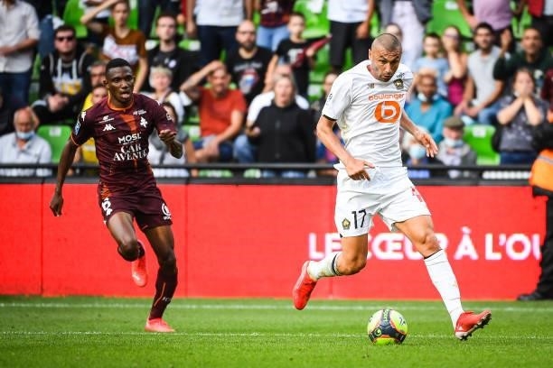 Mamadou FOFANA of Metz and Burak YILMAZ of Lille during the Ligue 1 football match between Metz and Lille at Stade Saint-Symphorien on August 8, 2021...