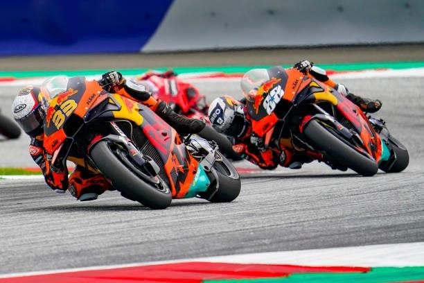 Brad Binder of South Africa and Red Bull KTM Factory Racing and Miguel Oliveira of Portugal and Red Bull KTM Factory Racing during the MotoGP of...