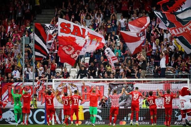 Supporters of FC Red Bull Salzburg cheer their team during the Admiral Bundesliga match between FC Red Bull Salzburg and Austria Wien at the Red Bull...