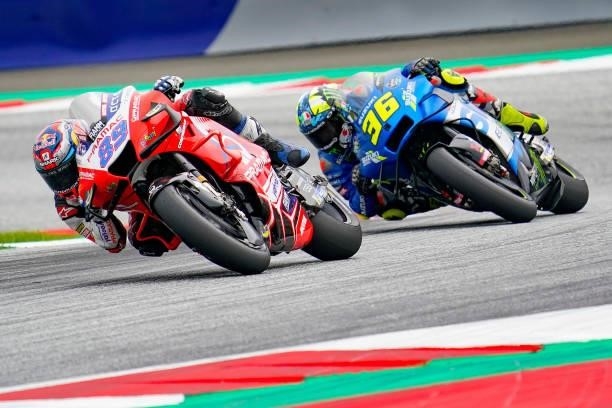 Jorge Martin of Spain and Pramac Racing and Joan Mir of Spain and Team Suzuki Ecstar during the MotoGP of Styria - Race at Red Bull Ring on August 8,...