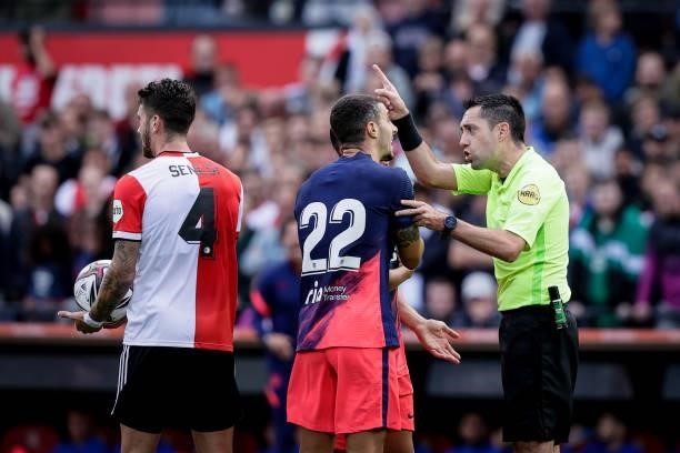 Mario Hermoso of Atletico Madrid, Referee Dennis Higler during the Club Friendly match between Feyenoord v Atletico Madrid at the Stadium Feijenoord...