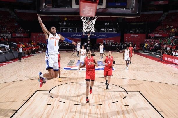 Obi Toppin of the New York Knicks dunks the ball against the Toronto Raptors during the 2021 Las Vegas Summer League on August 8, 2021 at the Thomas...