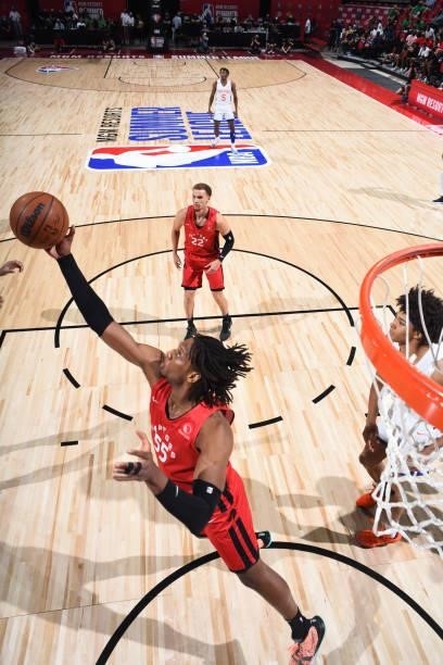 Freddie Gillespie of the Toronto Raptors rebounds the ball against the New York Knicks during the 2021 Las Vegas Summer League on August 8, 2021 at...