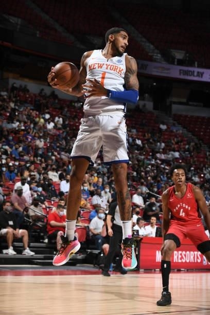 Obi Toppin of the New York Knicks rebounds the ball against the Toronto Raptors during the 2021 Las Vegas Summer League on August 8, 2021 at the...