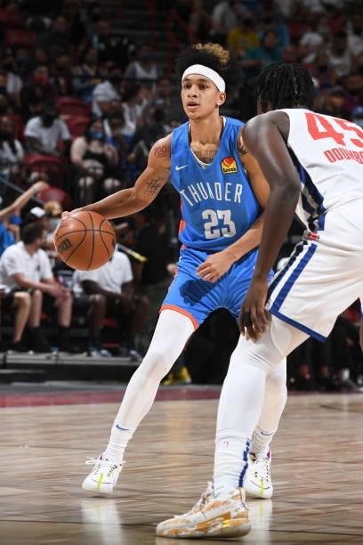 Tre Mann of the Oklahoma City Thunder handles the ball against the Detroit Pistons during the 2021 Las Vegas Summer League on August 8, 2021 at the...
