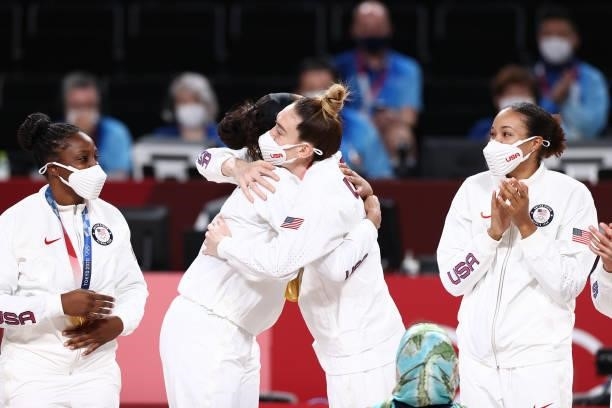 Ja Wilson presents Breanna Stewart of the USA Women's National Team with a Gold Medal during the 2020 Tokyo Olympics at the Super Saitama Arena on...