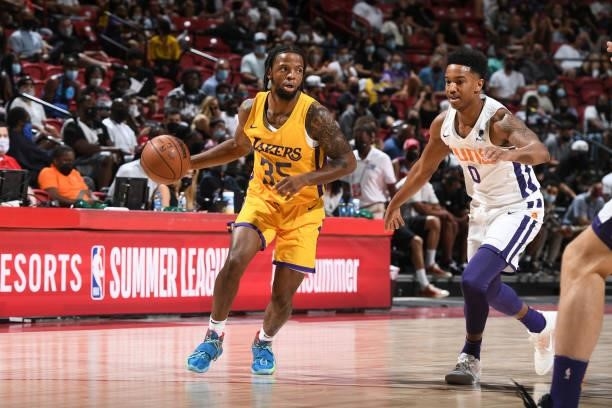 Zavier Simpson of the Los Angeles Lakers dribbles the ball against the Phoenix Suns during the 2021 Las Vegas Summer League on August 8, 2021 at the...