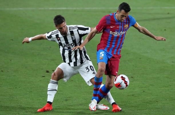 Rodrigo Bentancur and Sergio Busquets during the match between FC Barcelona and Juventus, corresponding to the friendy Joan Gamper Trophy, played at...