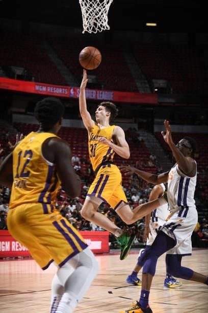 Austin Reaves of the Los Angeles Lakers drives to the basket against the Phoenix Suns during the 2021 Las Vegas Summer League on August 8, 2021 at...