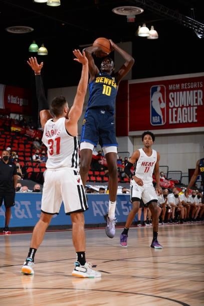 Bol Bol of the Denver Nuggets shoots the ball against the Miami Heat during the 2021 Las Vegas Summer League on August 8, 2021 Cox Pavilion in Las...