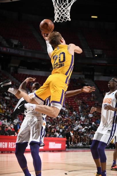 Mac McClung of the Los Angeles Lakers drives to the basket against the Phoenix Suns during the 2021 Las Vegas Summer League on August 8, 2021 at the...
