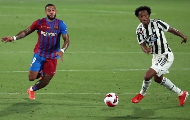 Memphis Depay and Juan Caudrado during the match between FC Barcelona and Juventus, corresponding to the friendy Joan Gamper Trophy, played at the...