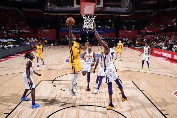 Devontae Cacok of the Los Angeles Lakers drives to the basket against the Phoenix Suns during the 2021 Las Vegas Summer League on August 8, 2021 at...