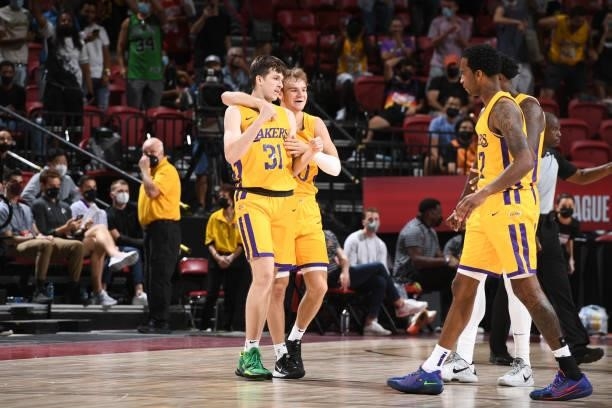 Austin Reaves and Mac McClung of the Los Angeles Lakers celebrate a win after the game against the Phoenix Suns during the 2021 Las Vegas Summer...