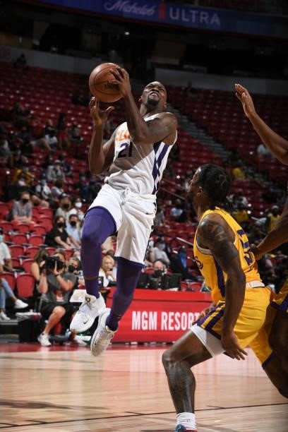 Michael Frazier II of the Phoenix Suns drives to the basket against the Los Angeles Lakers during the 2021 Las Vegas Summer League on August 8, 2021...