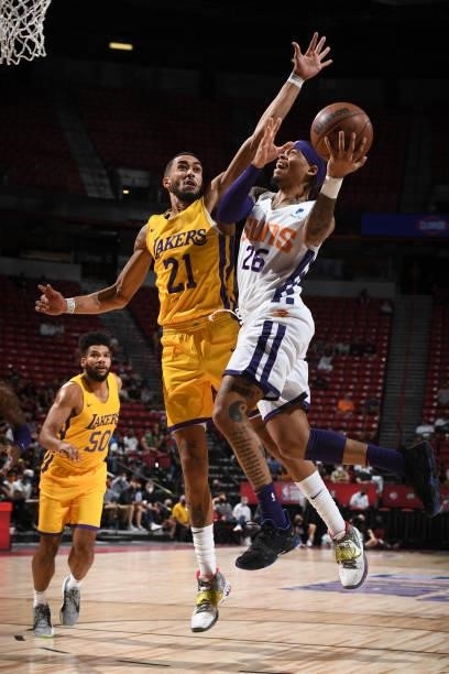 Nate Mason of the Phoenix Suns drives to the basket against the Los Angeles Lakers during the 2021 Las Vegas Summer League on August 8, 2021 at the...