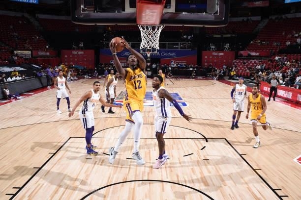 Devontae Cacok of the Los Angeles Lakers drives to the basket against the Phoenix Suns during the 2021 Las Vegas Summer League on August 8, 2021 at...