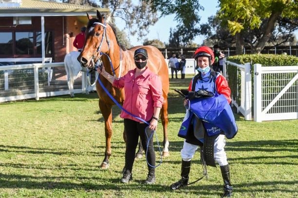 Trainer Kylie Vella with Steven Vella after their horse First Mate won the The Gateway BM64 Handicap at Mildura Racecourse on August 09, 2021 in...