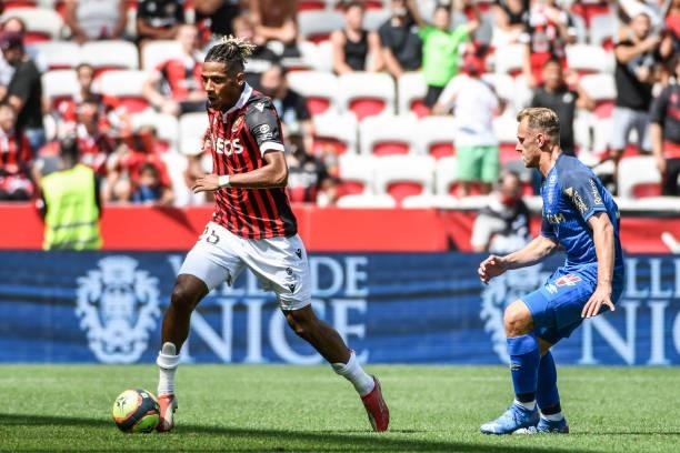 Jean-Clair TODIBO of Nice and Kaj SIERHUIS of Reims during the Ligue 1 football match between Nice and Reims at Allianz Riviera on August 8, 2021