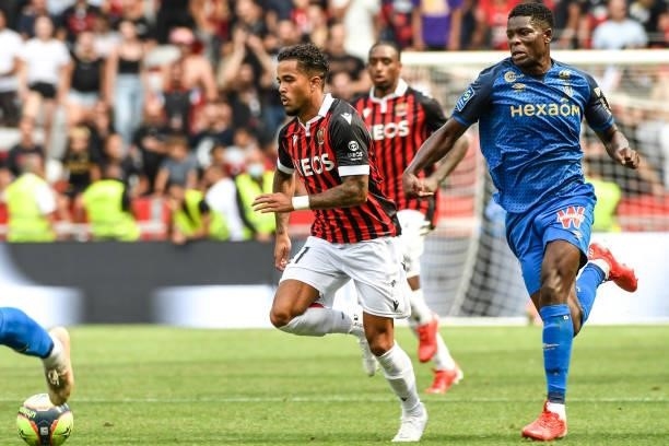Justin KLUIVERT of Nice and Marshall MUNETSI of Reims during the Ligue 1 football match between Nice and Reims at Allianz Riviera on August 8, 2021