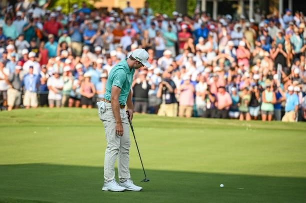 Sam Burns reacts after missing a birdie putt on the 18th hole green during a playoff in the final round of the World Golf Championships-FedEx St....