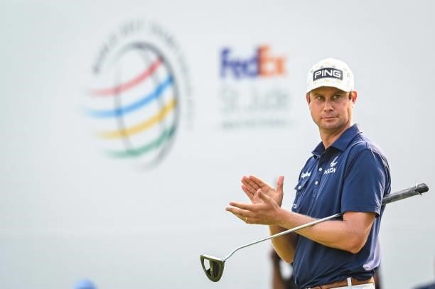 Harris English applauds a St. Jude Childrens Research Hospital patient on the 18th hole during the final round of the World Golf Championships-FedEx...