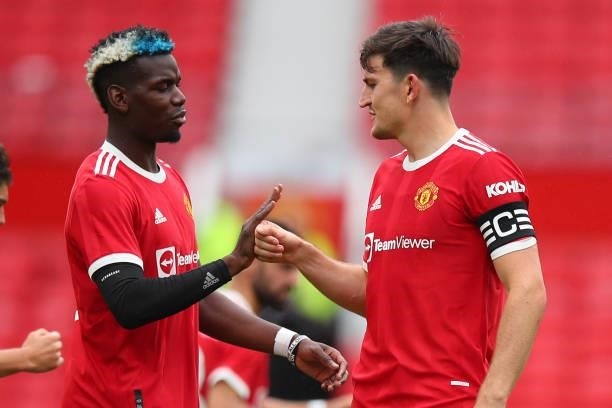 Paul Pogba and Harry Maguire of Manchester United during the Pre Season Friendly fixture between Manchester United and Everton at Old Trafford on...