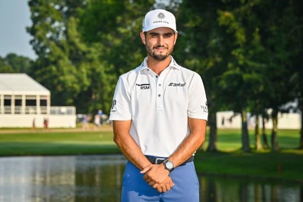 Abraham Ancer of Mexico smiles during the trophy ceremony following his playoff victory in the final round of the World Golf Championships-FedEx St....