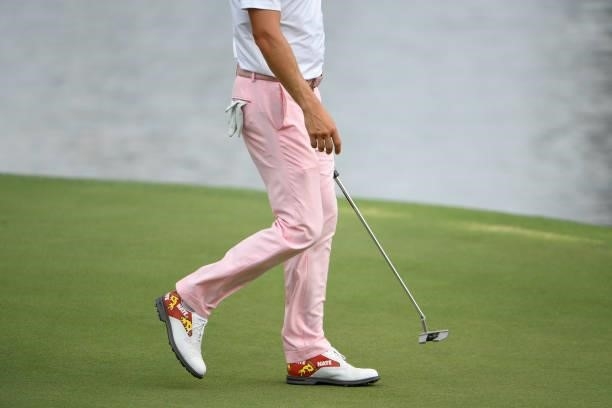 Justin Thomas shoes designed by a St. Jude Childrens Research Hospital patient, at the 18th green during the final round of the World Golf...