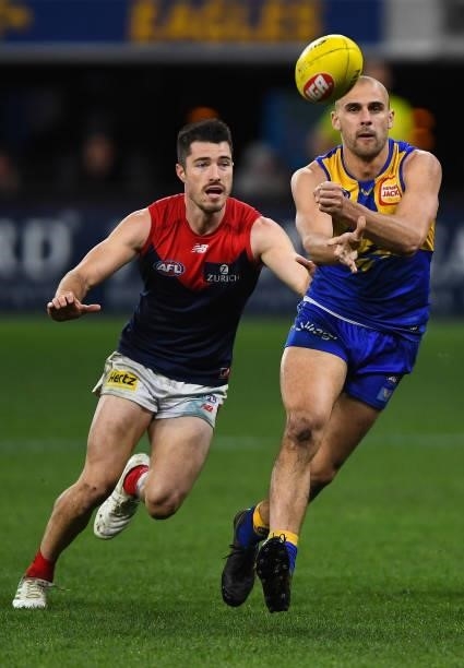 Dom Sheed of the Eagles handpasses the ball during the 2021 AFL Round 21 match between the West Coast Eagles and the Melbourne Demons at Optus...
