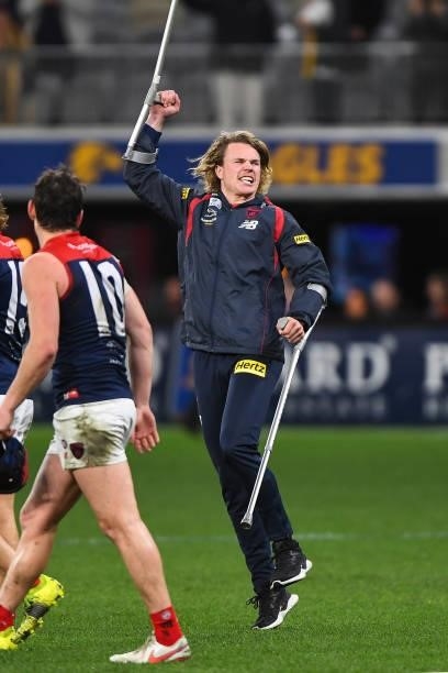 Jayden Hunt of the Demons celebrates the win during the 2021 AFL Round 21 match between the West Coast Eagles and the Melbourne Demons at Optus...