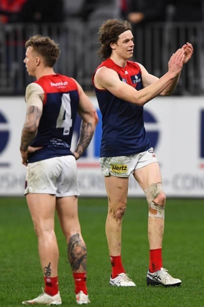 Ben Brown of the Demons celebrates with the fans during the 2021 AFL Round 21 match between the West Coast Eagles and the Melbourne Demons at Optus...