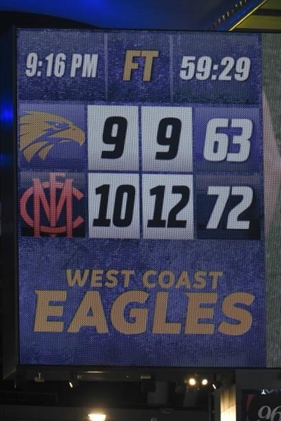 The final score and quarter length reaches 59 minutes during the 2021 AFL Round 21 match between the West Coast Eagles and the Melbourne Demons at...