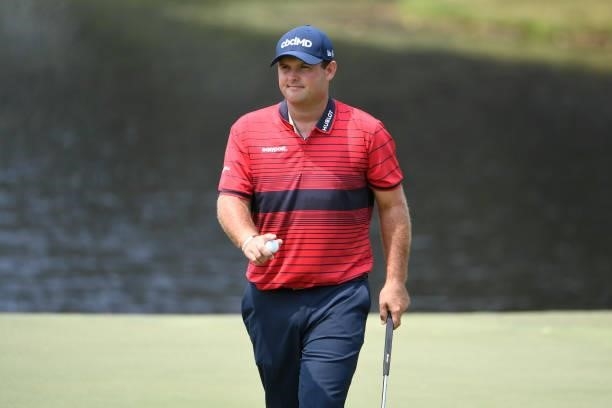Patrick Reed at the ninth green does a ball wave during the final round of the World Golf Championships-FedEx St. Jude Invitational at TPC Southwind...