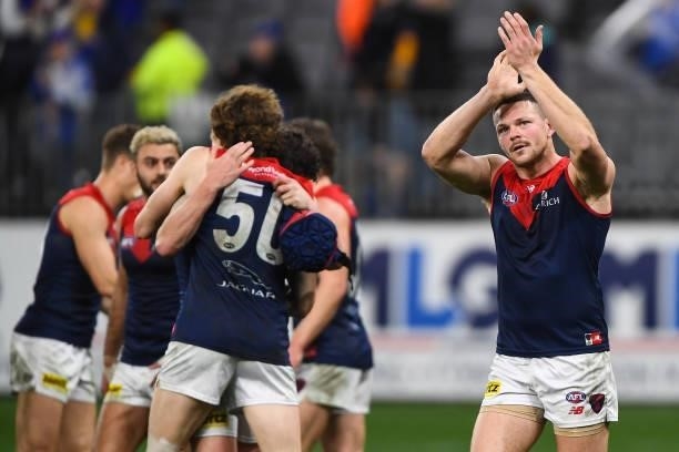 Steven May of the Demons celebrates with the fans during the 2021 AFL Round 21 match between the West Coast Eagles and the Melbourne Demons at Optus...