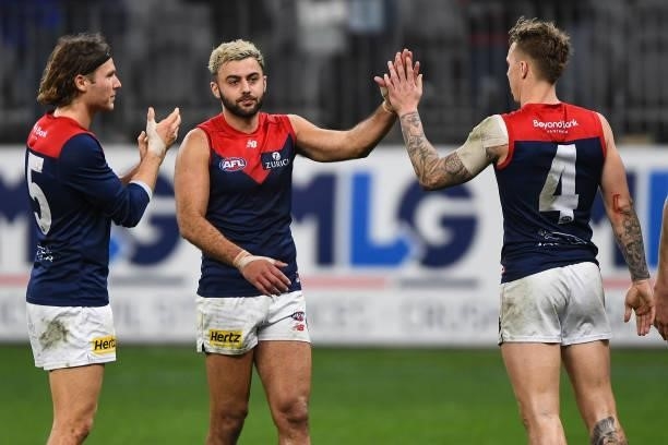 Christian Salem of the Demons celebrates the win during the 2021 AFL Round 21 match between the West Coast Eagles and the Melbourne Demons at Optus...