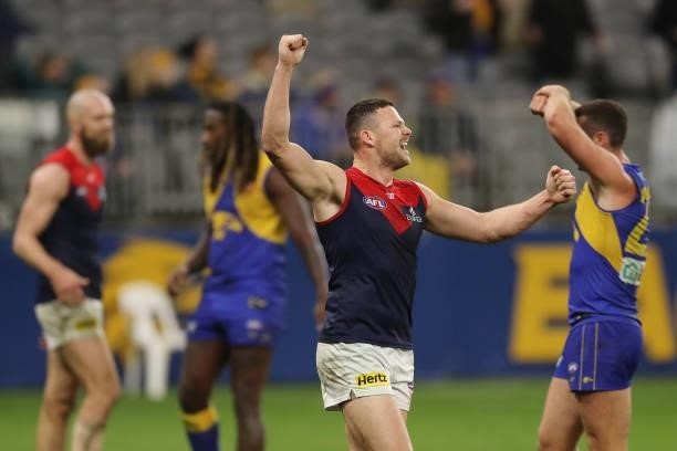 Steven May of the Demons celebrates after the teams win during the 2021 AFL Round 21 match between the West Coast Eagles and the Melbourne Demons at...